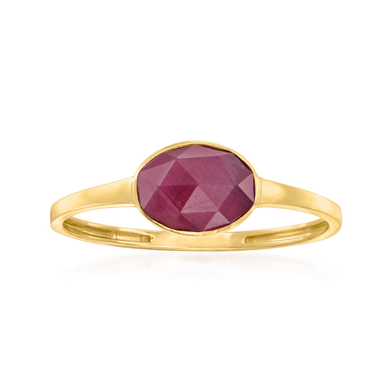 Oval faceted ruby center on 14kt yellow gold band ring