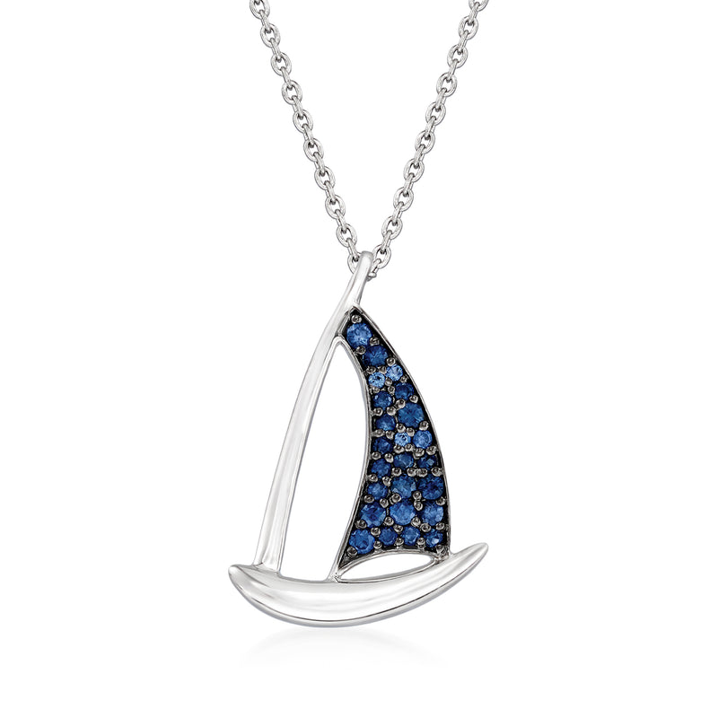 Sterling silver sailboat pendant necklace with blue sapphire-style stone sail