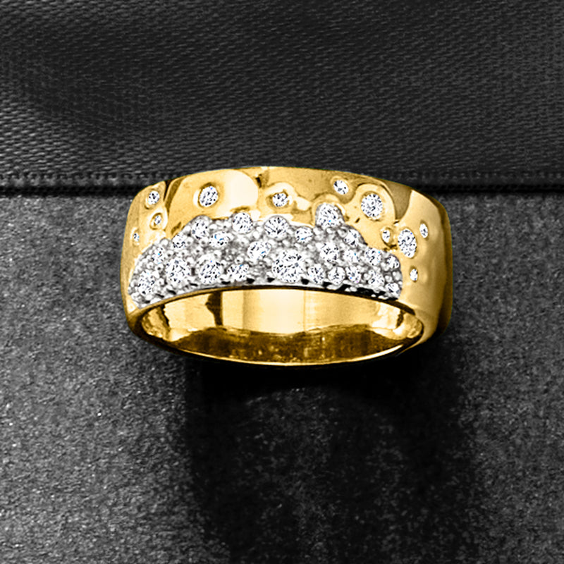 Gold over sterling wide ring with scattered round diamonds across the top.