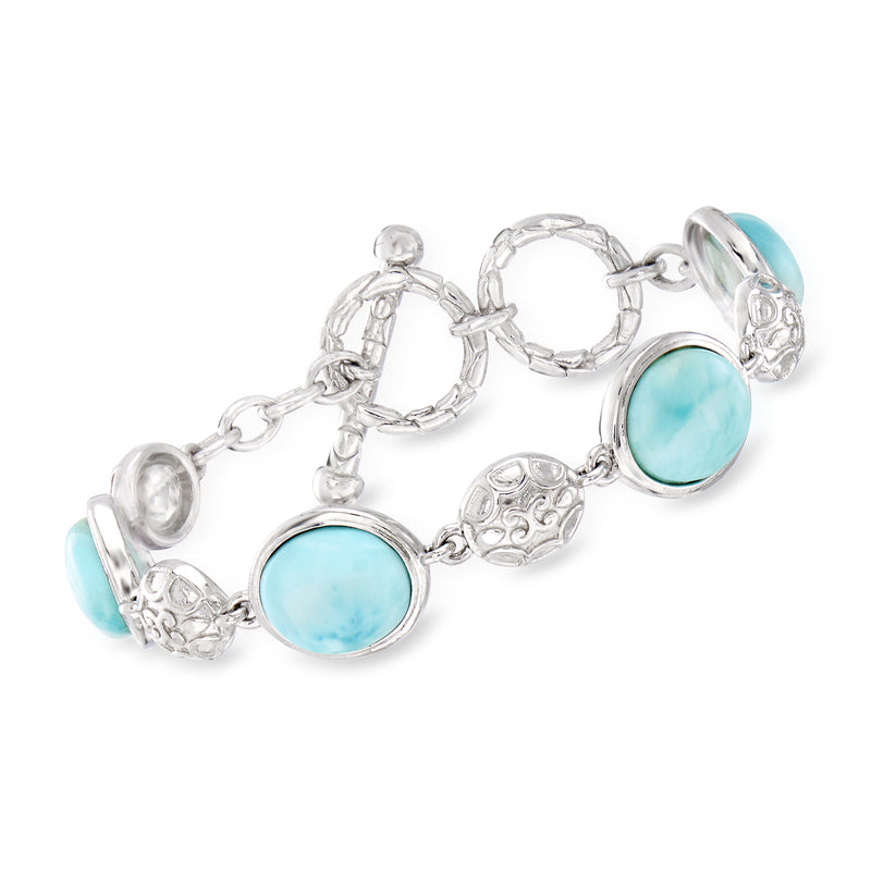 Sterling silver toggle bracelet with oval light blue Larimar cabochons and ornate links