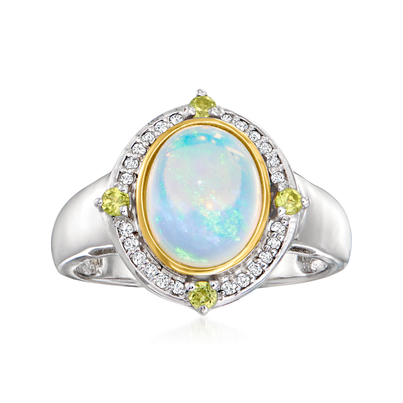 Oval opal ring with diamond halo, peridot accents, sterling silver and 14kt yellow gold bezel
