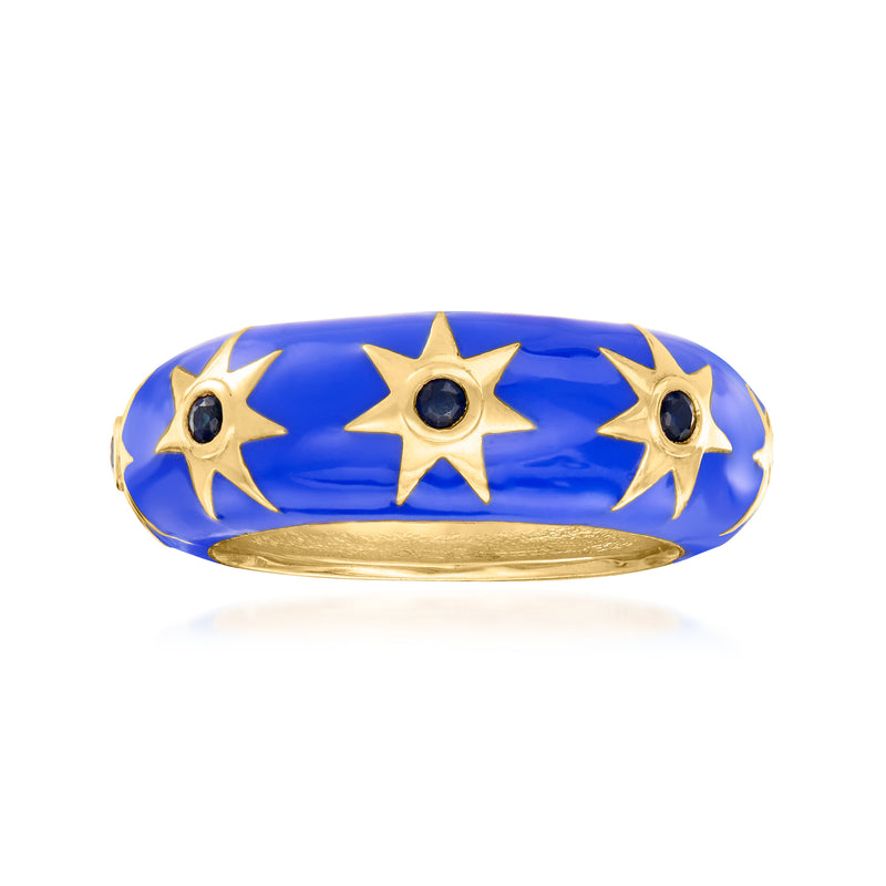 18kt gold over sterling ring with blue enamel center and three gold stars with dark gemstones