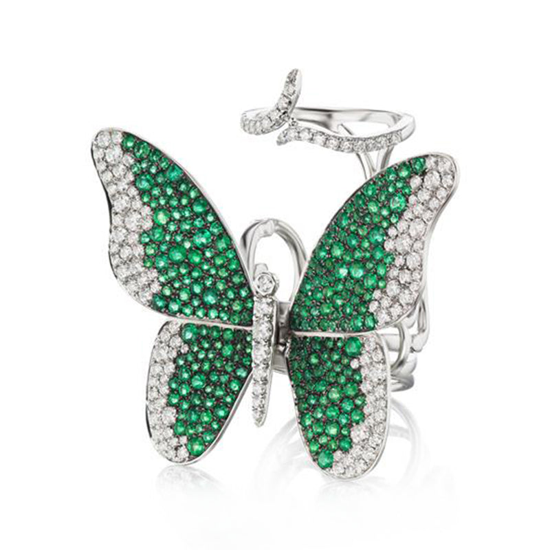 White gold butterfly double ring with emerald and diamond pavé wings
