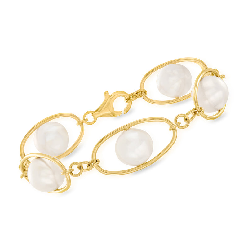 Gold link bracelet with white oval cultured pearls
