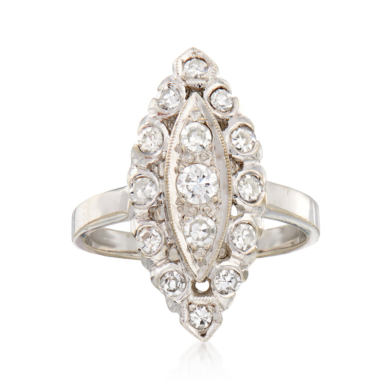 Vintage navette diamond cluster ring in 14kt white gold, oval center and side stones