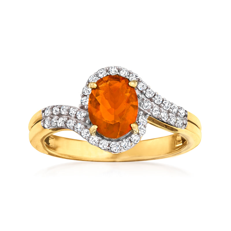 14kt yellow gold ring with oval orange fire opal center and round diamond halo band