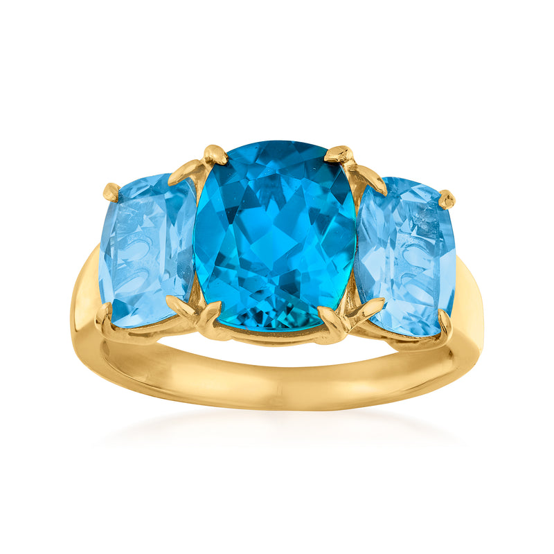 18kt gold over sterling ring with three blue topaz stones, oval center and side stones