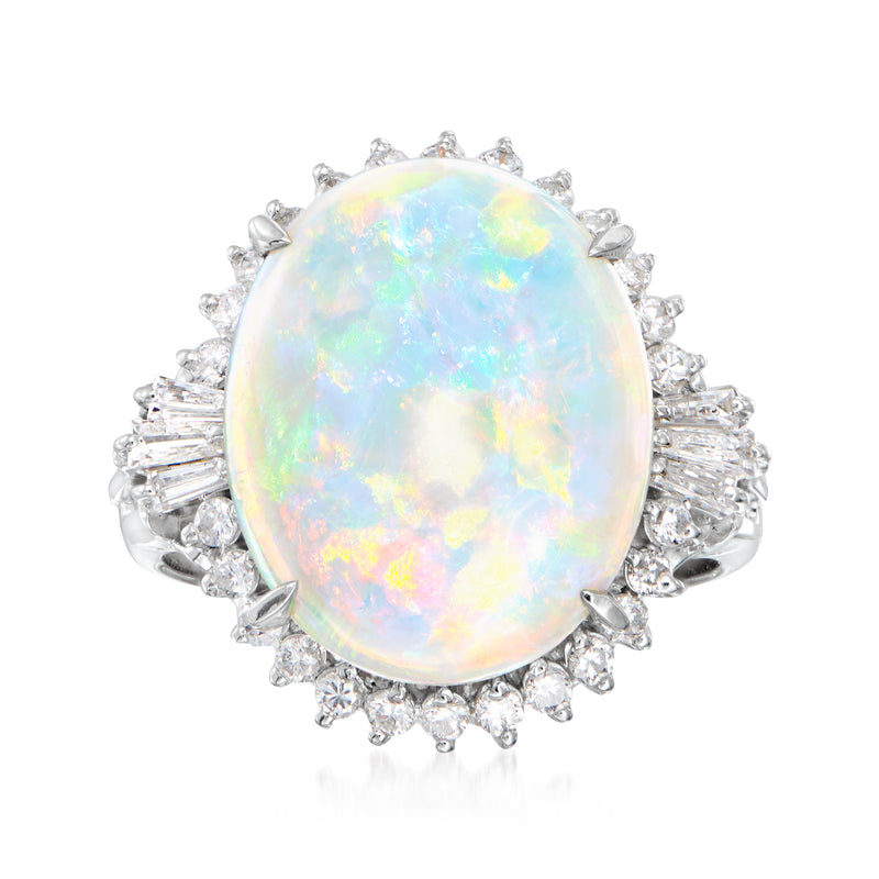 Vintage opal diamond ring in platinum, oval opal center with diamond halo and prongs