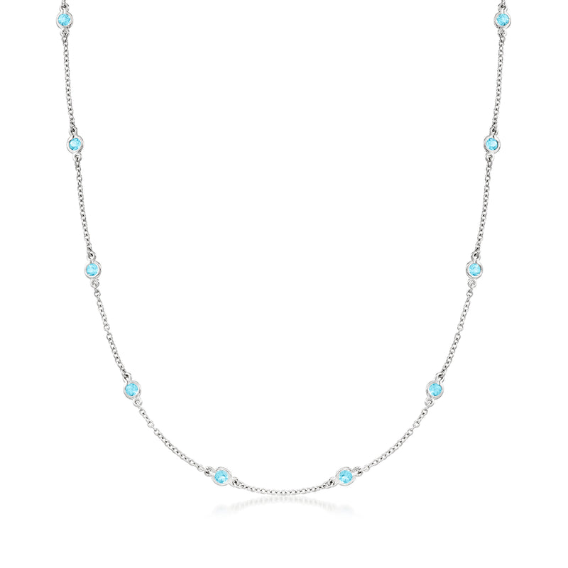 Sterling silver station necklace with bezel-set Swiss blue topaz stones