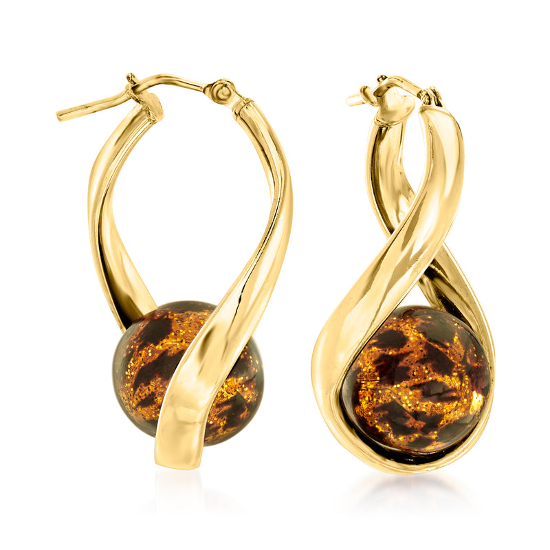 Twisted gold hoop earrings with amber-brown Murano glass drop detail