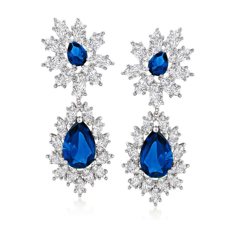 Sterling silver drop earrings with blue teardrop stones and CZ snowflake clusters