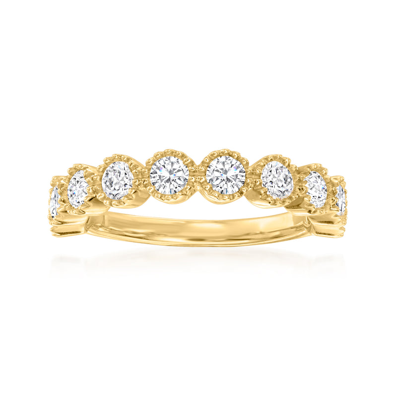 14kt yellow gold milgrain diamond ring with five round stones on a curved band