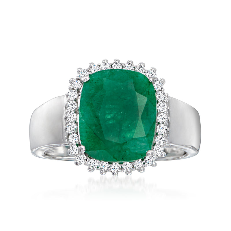 Sterling silver ring with emerald-cut green gemstone and white topaz halo