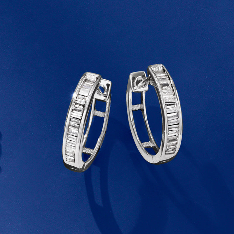 Diamond huggie hoop earrings in 14kt white gold, front view