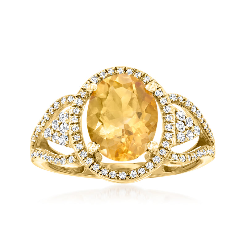 14kt yellow gold oval citrine halo ring with round diamond accents, split shank