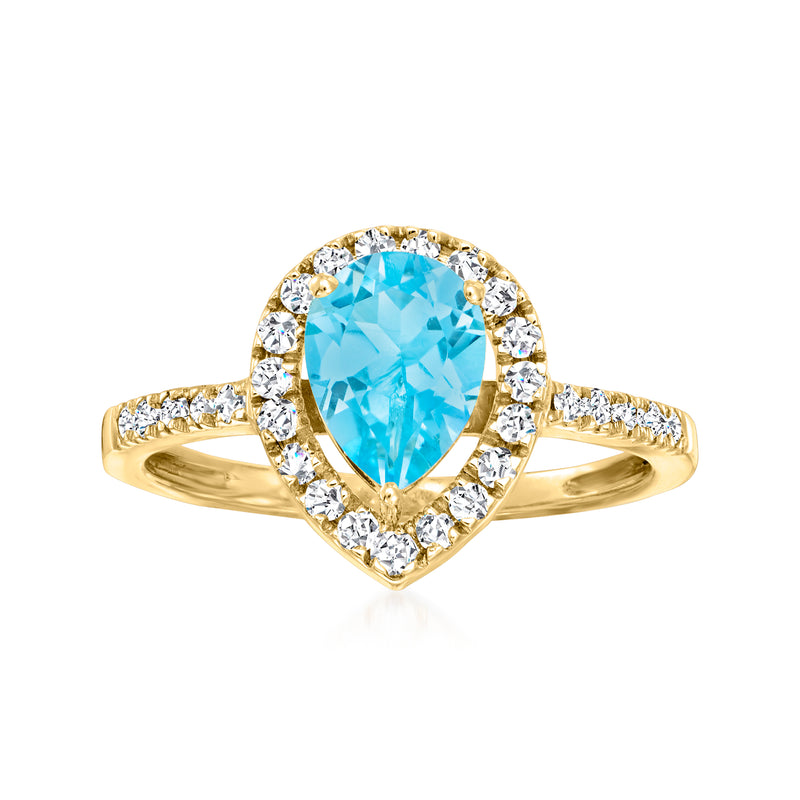 14kt yellow gold ring with oval Swiss blue topaz and diamond halo, pave sides