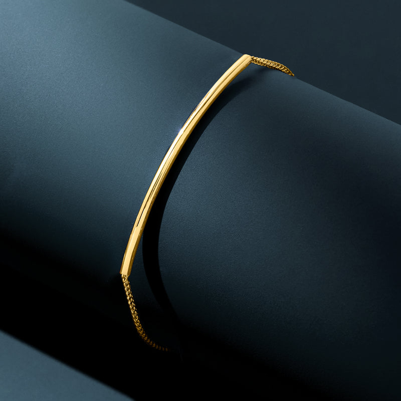 Round bar bolo bracelet in 14kt yellow gold with braided rope edge