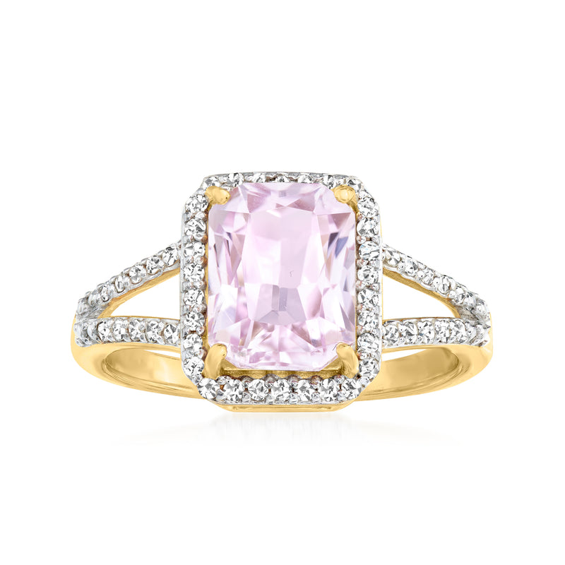 Kunzite ring with rectangular pink gemstone, diamond halo, and gold over sterling band