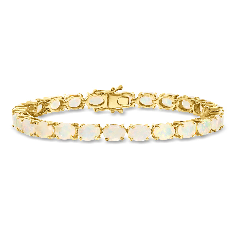 18kt gold tennis bracelet with light opal oval stones and box clasp
