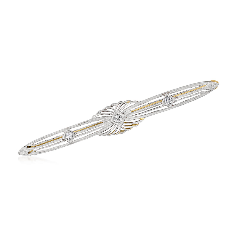 Vintage diamond bar pin with platinum setting and yellow gold accents