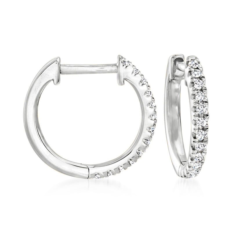 14kt white gold huggie hoop earrings with diamond-accented band and clasp backing