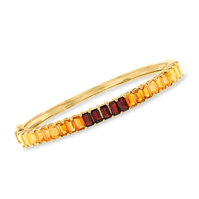 Gold over sterling bangle bracelet with alternating orange and dark red gemstones