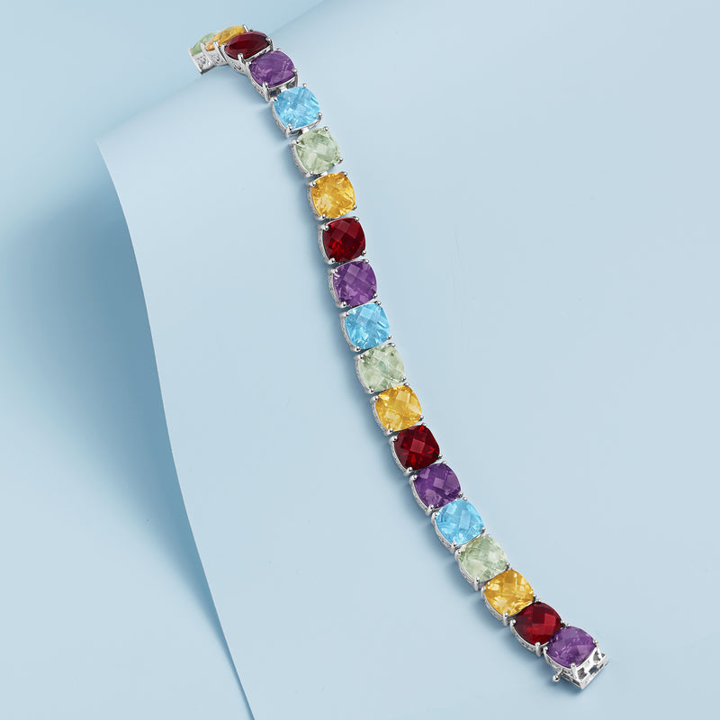 Sterling silver multi-gemstone tennis bracelet angled view with mixed colored stones