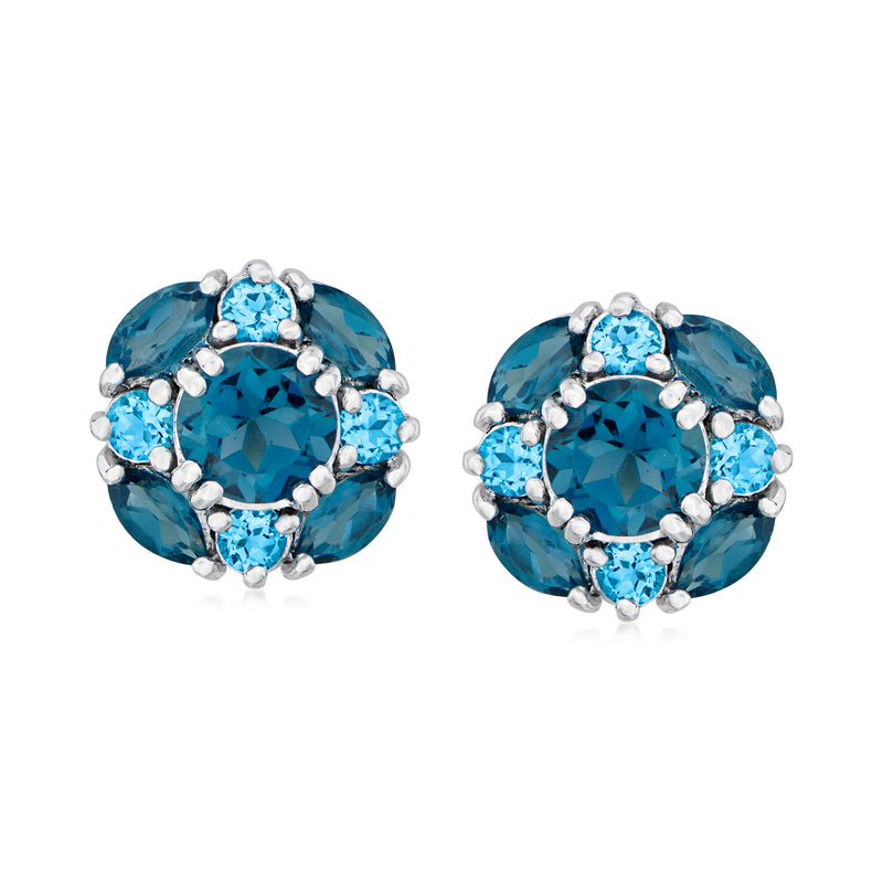 Sterling silver blue topaz stud earrings with oval blue center and round stone halo