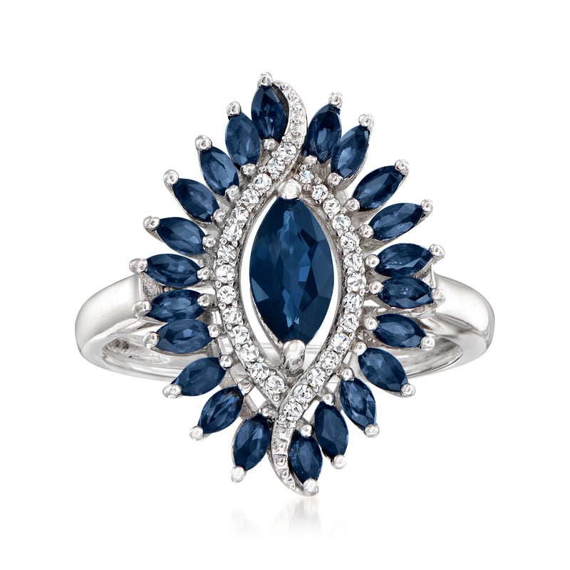Sterling silver ring with marquise sapphire center stone and diamond halo accents