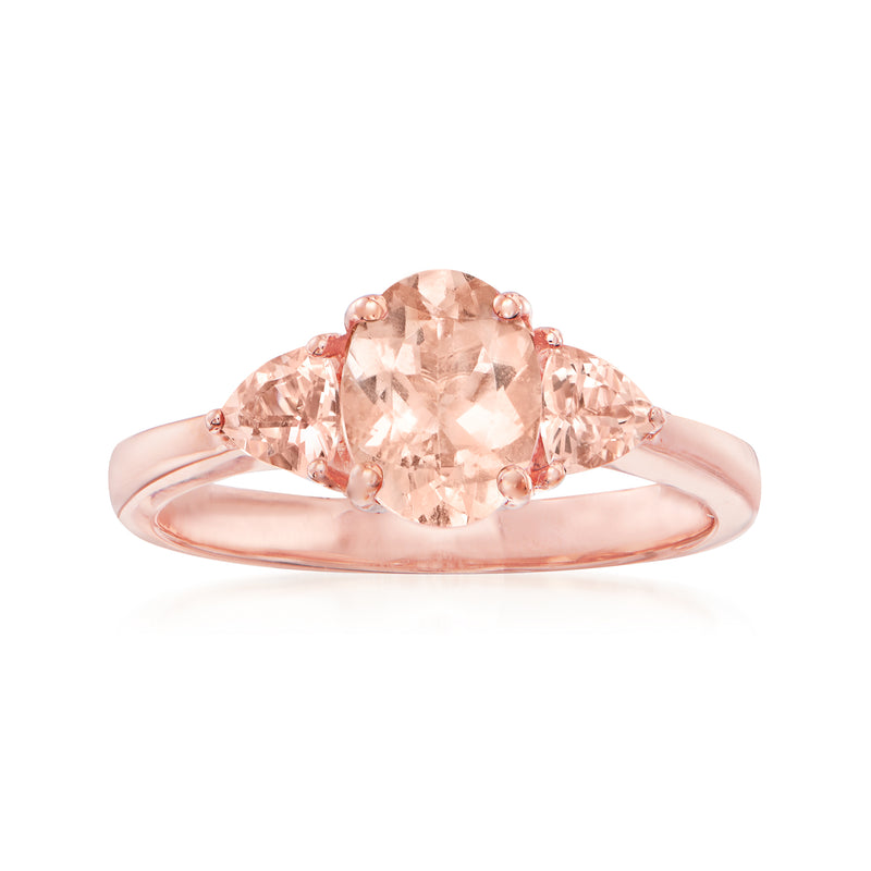14kt rose gold three-stone ring with oval morganite center and side stones