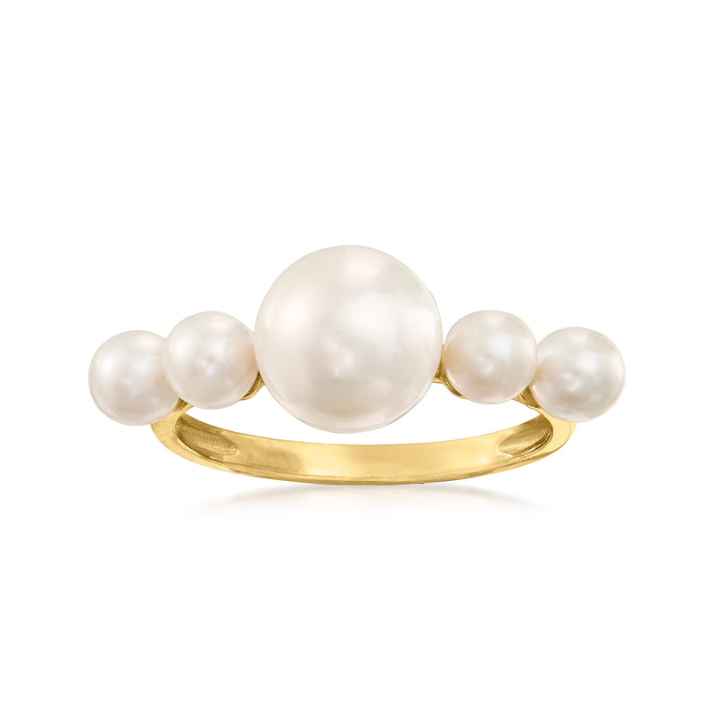 14kt yellow gold ring with large cultured pearl center and three smaller pearls