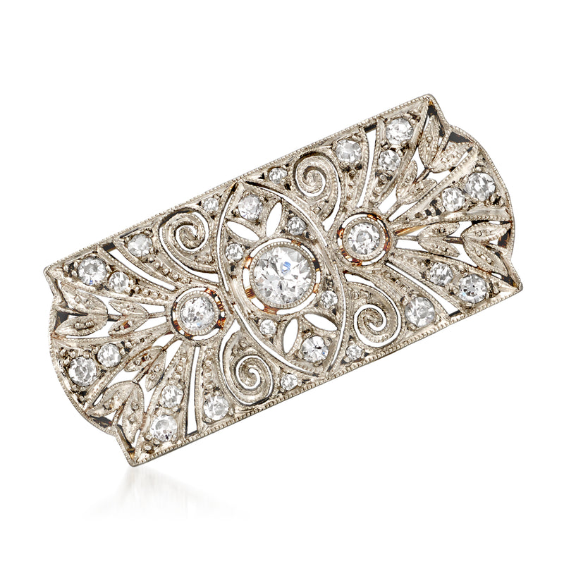 Vintage diamond filigree pin with round stones in ornate rectangular platinum setting