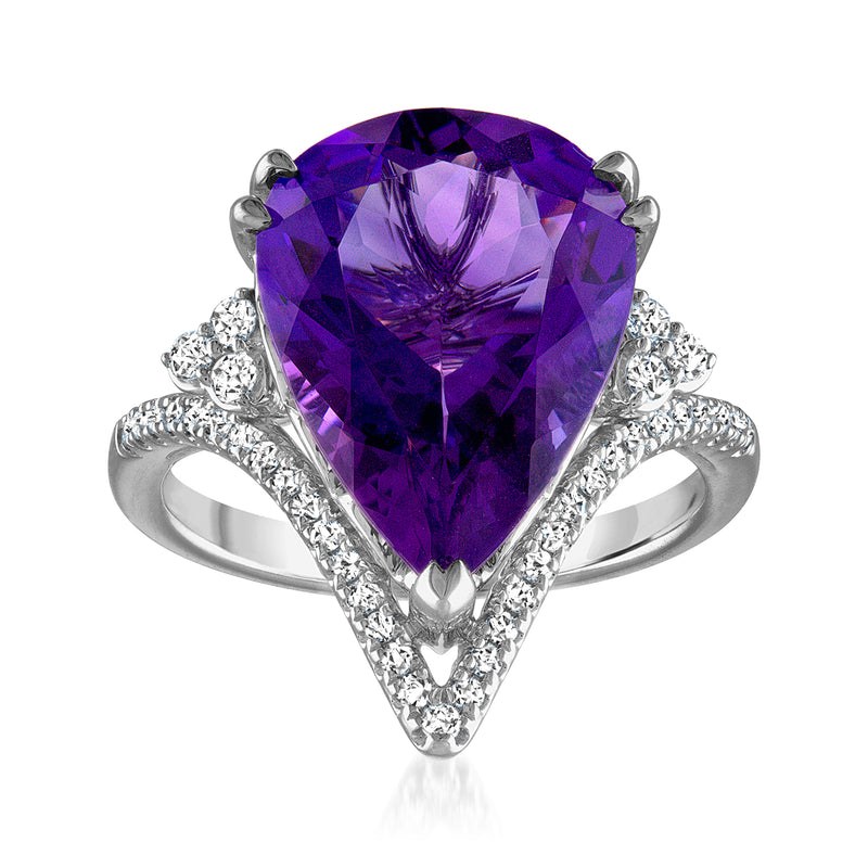Amethyst ring with pear-cut purple stone and diamond accents in white gold