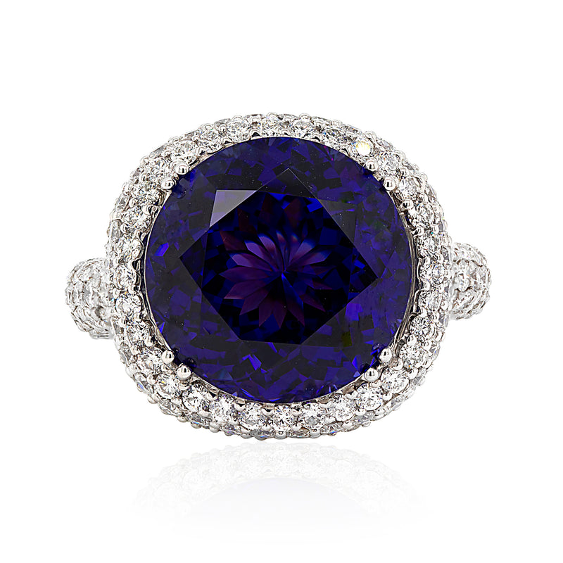 Blue tanzanite ring with diamond halo and 14kt white gold setting