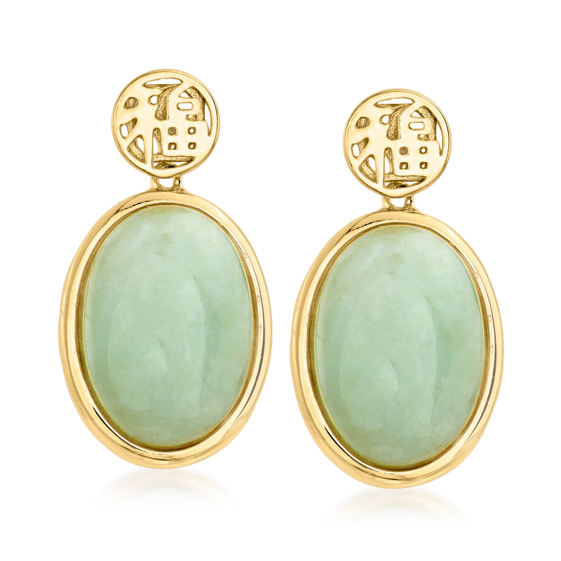 Gold over sterling drop earrings with carved motif and oval light-green jade cabochons.