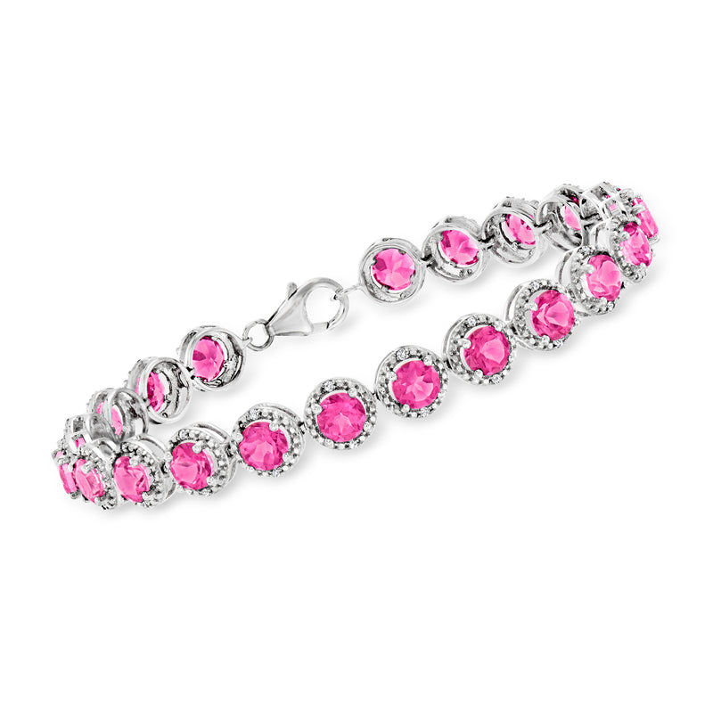 Sterling silver tennis bracelet with round pink gemstones and small clear diamond accents