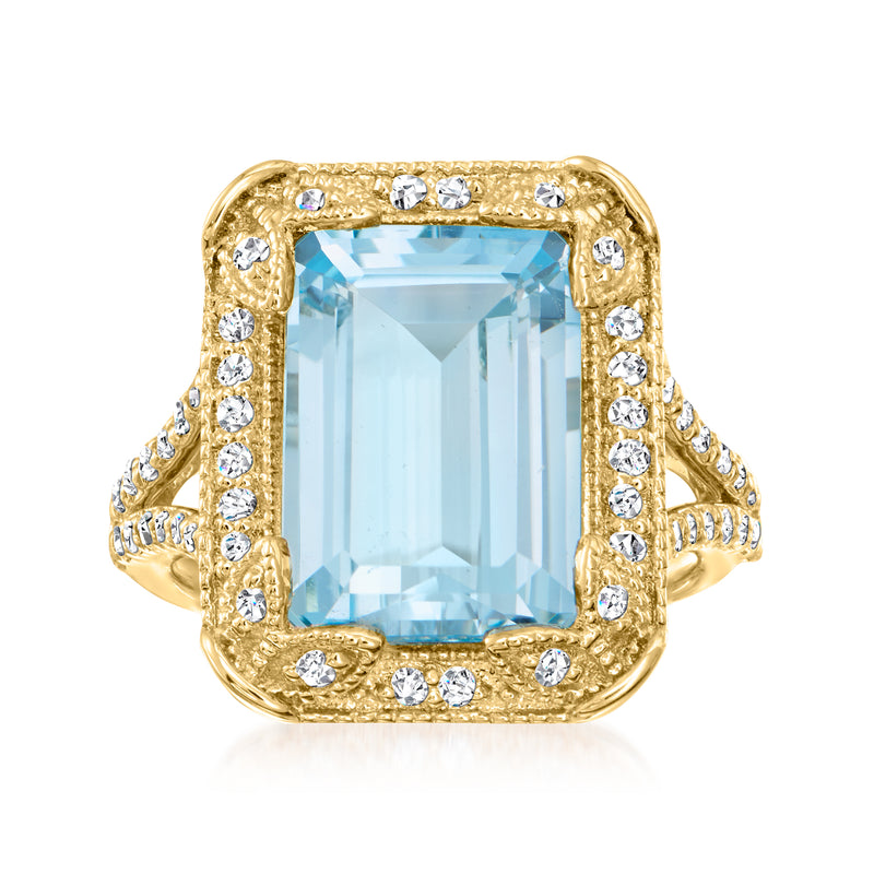 18kt gold ring with rectangular sky blue topaz center and white crystal halo