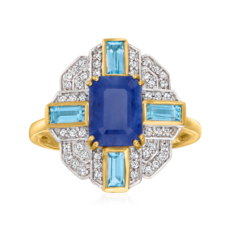 14kt yellow gold ring with blue sapphire center, blue topaz sides, diamond accents