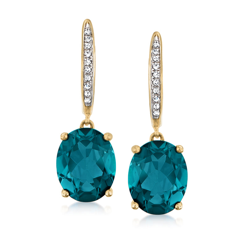 14kt yellow gold drop earrings with oval London blue topaz and diamond halo accents