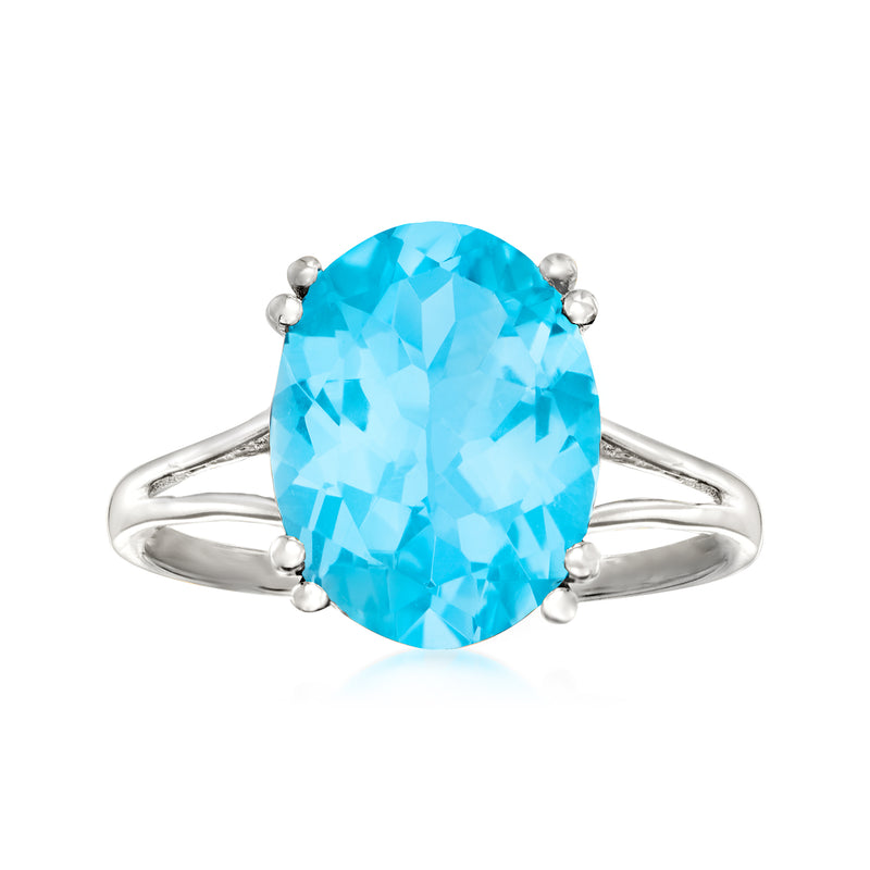 Sterling silver ring with oval sky blue gemstone in four-prong setting