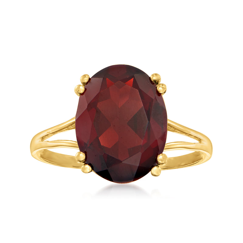 Oval garnet ring in 18kt gold over sterling with faceted deep red stone