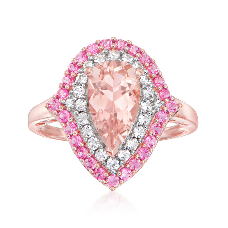 Peach oval gemstone ring with pink sapphire halo and side crystal accents in rose gold