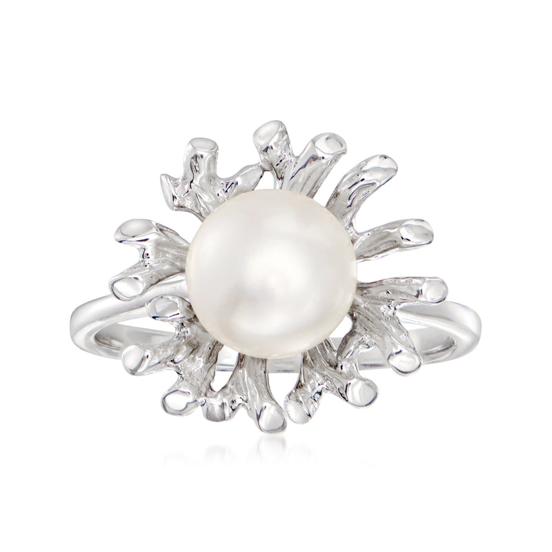 Sterling silver flower ring with a round cultured pearl center, polished metal petals