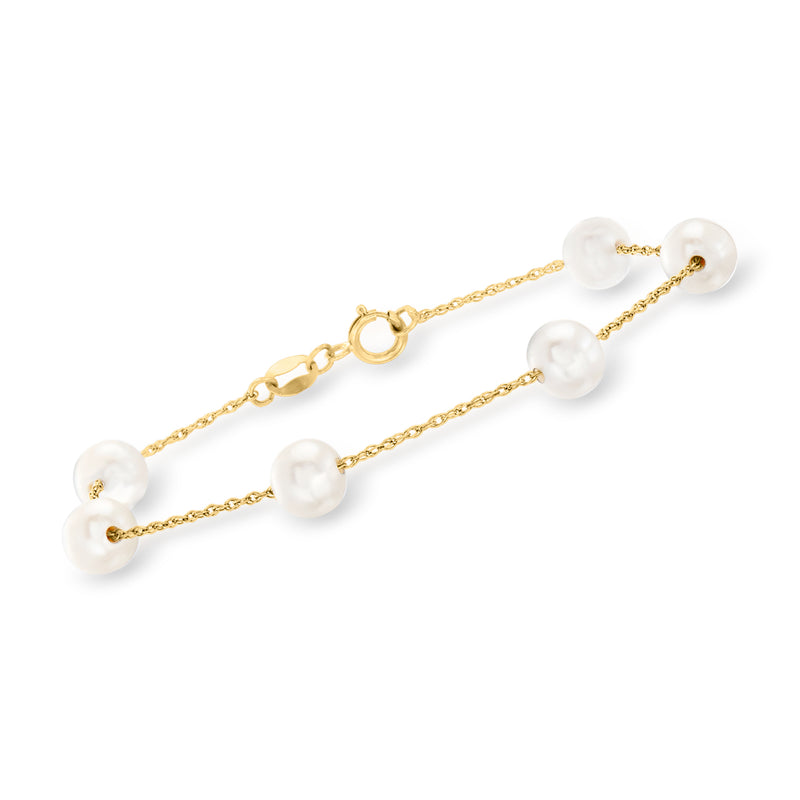 14kt yellow gold bracelet with white cultured pearls on station links, gold chain