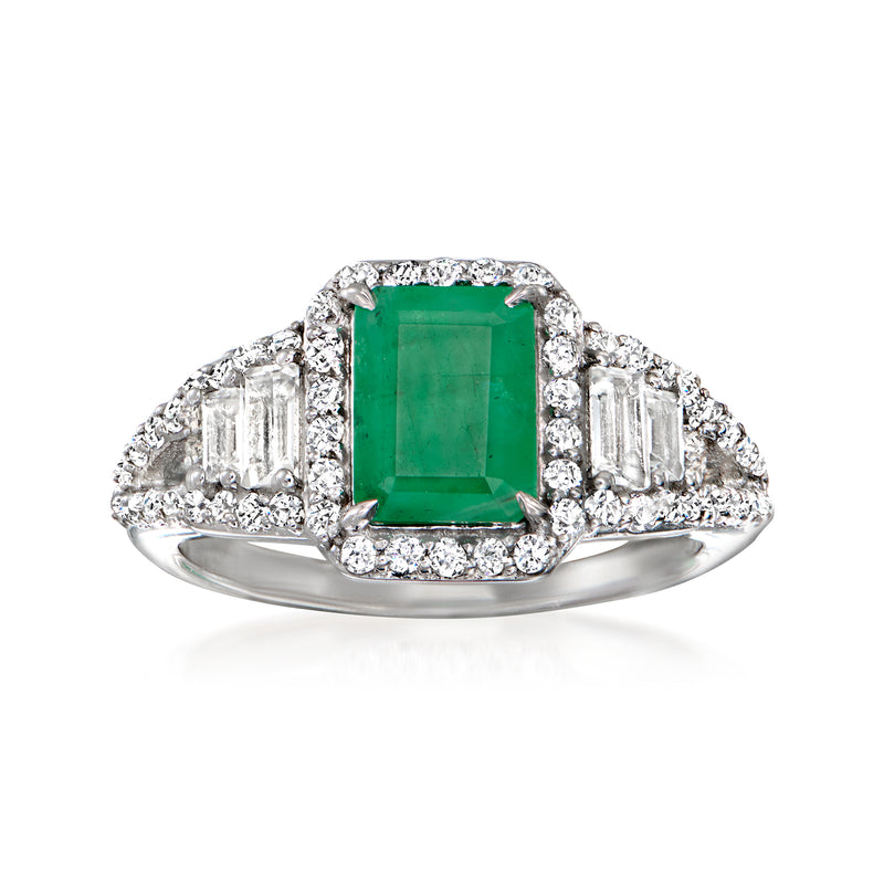 Sterling silver ring with green emerald-cut center stone and side baguette white topaz