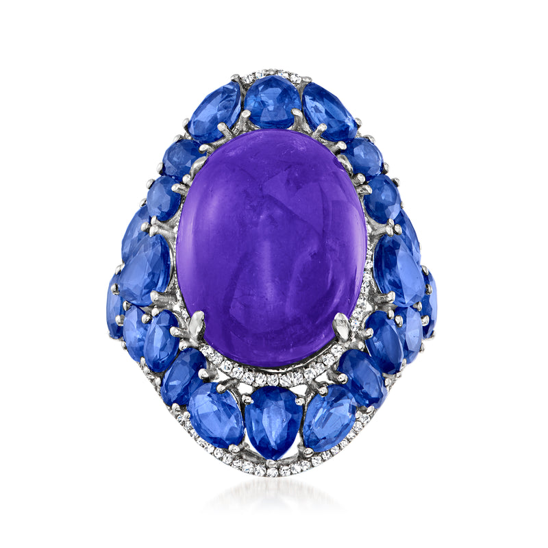 Oval purple tanzanite ring with blue gemstones and diamond accents in white gold