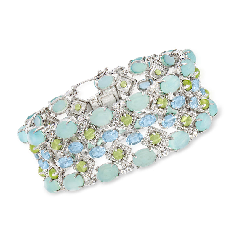 Sterling silver multi-gemstone bracelet with oval light blue and green stones