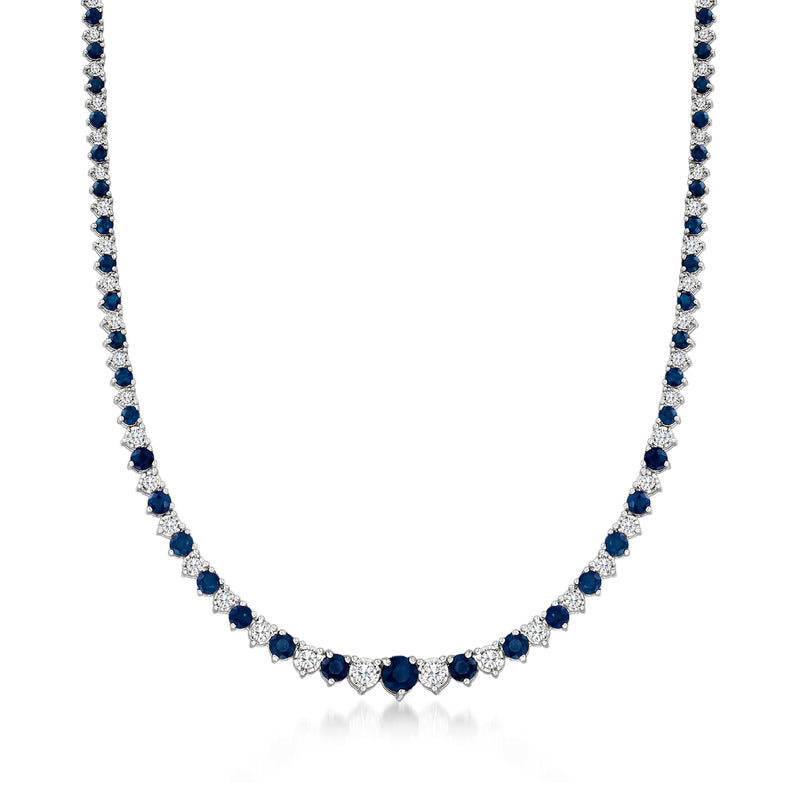 Sterling silver tennis necklace with blue sapphire and diamond stations, full length