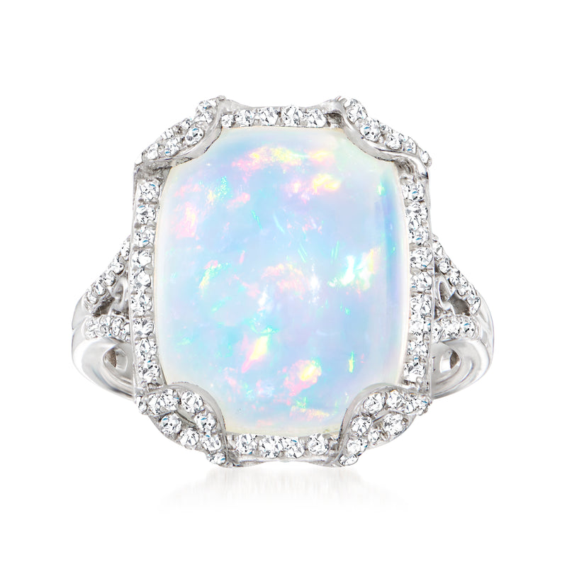 Opal and diamond halo ring in 14kt white gold, cushion-cut opal center
