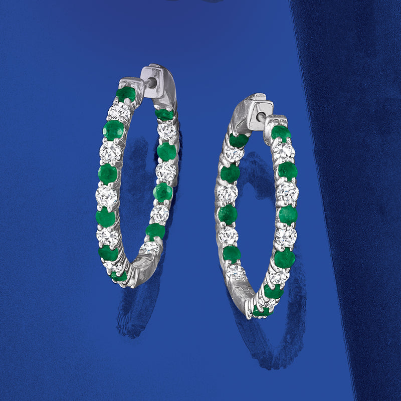 Sterling silver inside-out hoop earrings with alternating green emeralds and white diamonds.